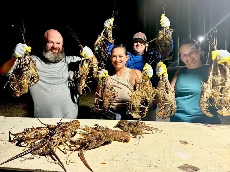 Anglers celebrating a lobster catch